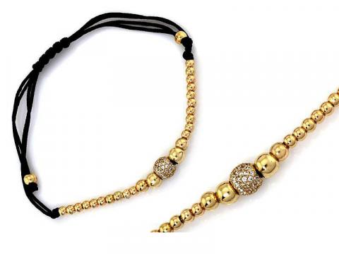 Złota bransoletka na czarnym sznureczku z Opiume Życie Pabianic